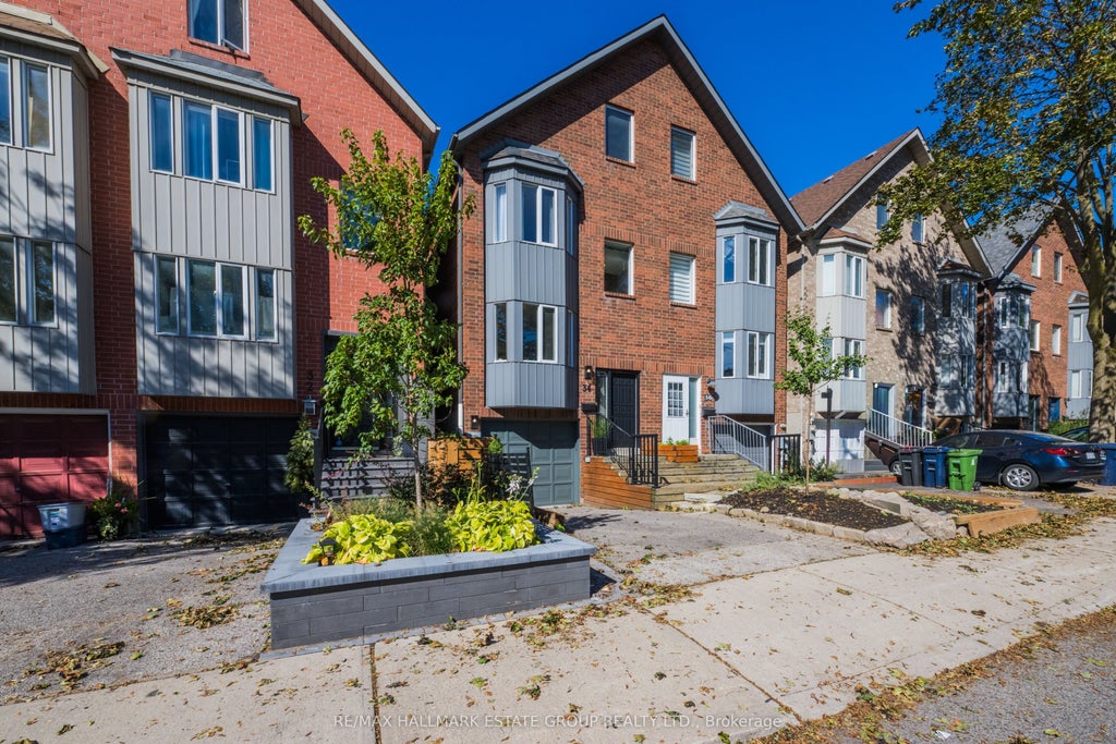Photo of 34 Woodrow Avenue, Toronto, ON M4C 5S2 (MLS # E13819552)