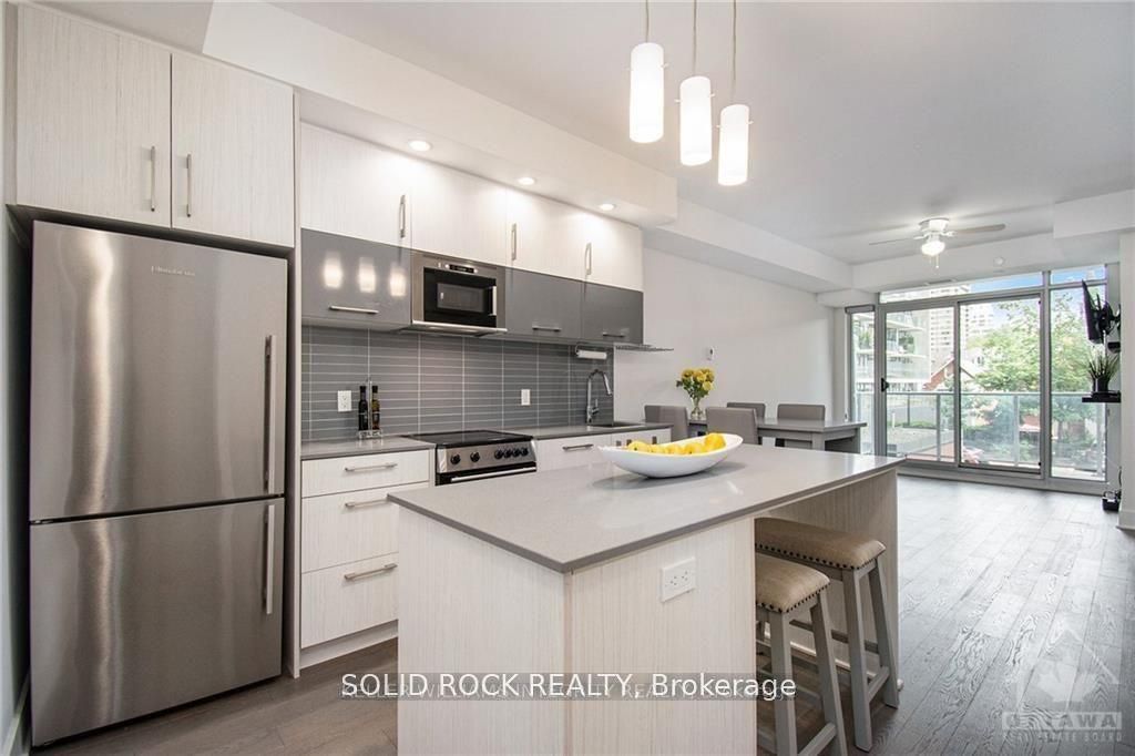 Photo of 255 Bay Street #213, Ottawa Centre, ON K1R 5Z4 (MLS # X13079826)
