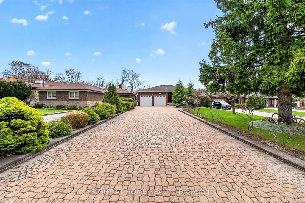 Photo of 397 Maple Leaf Drive, Toronto, ON M6L 1P4 (MLS # W13040428)
