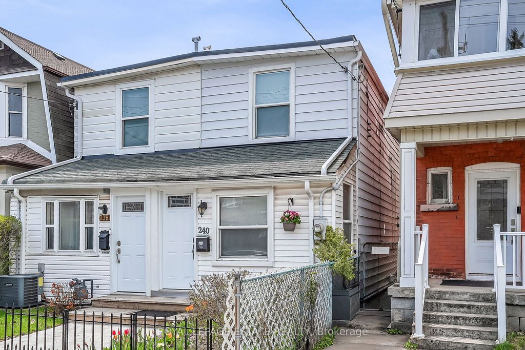 Photo of 240 Cedarvale Avenue, Toronto, ON M4C 4K2 (MLS # E13082440)