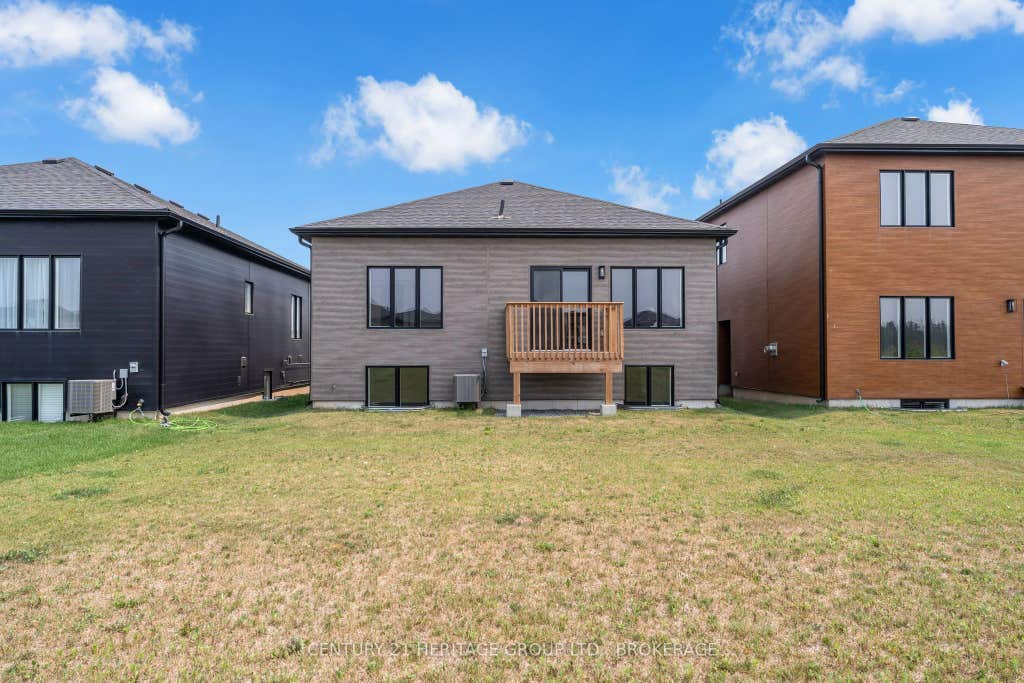 Photo of 60 Dusenbury Drive, Loyalist, ON K0H 2H0 (MLS # X13653032)