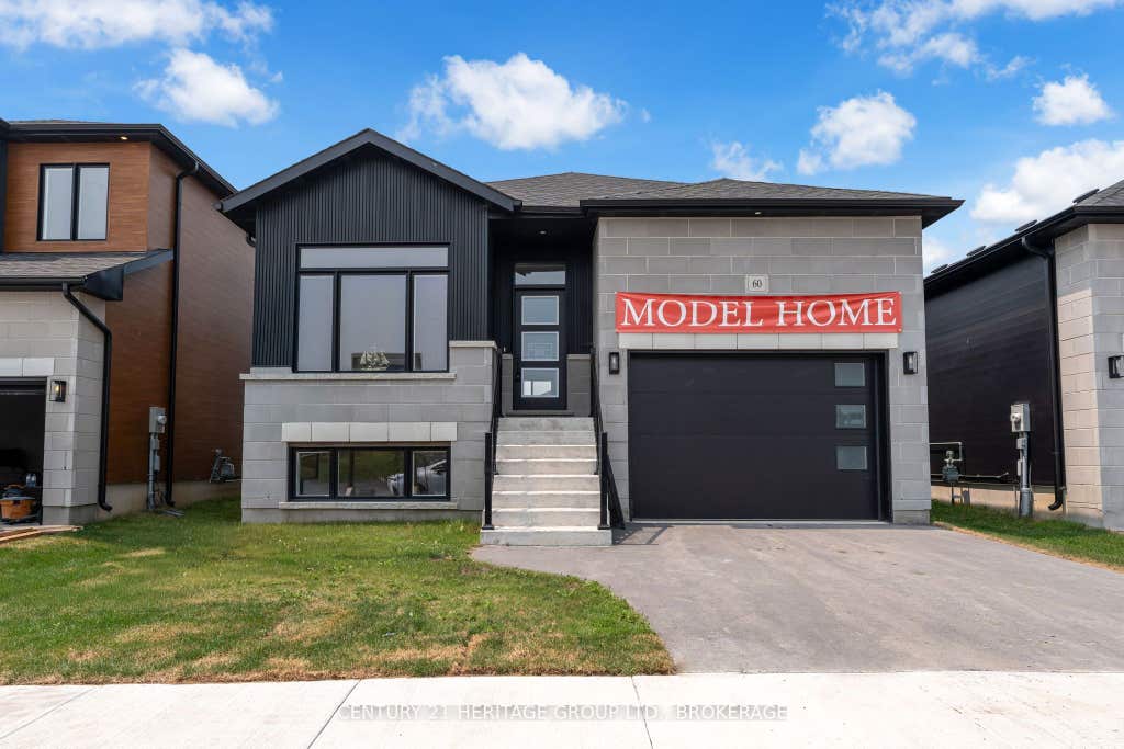 Photo of 60 Dusenbury Drive, Loyalist, ON K0H 2H0 (MLS # X13653032)
