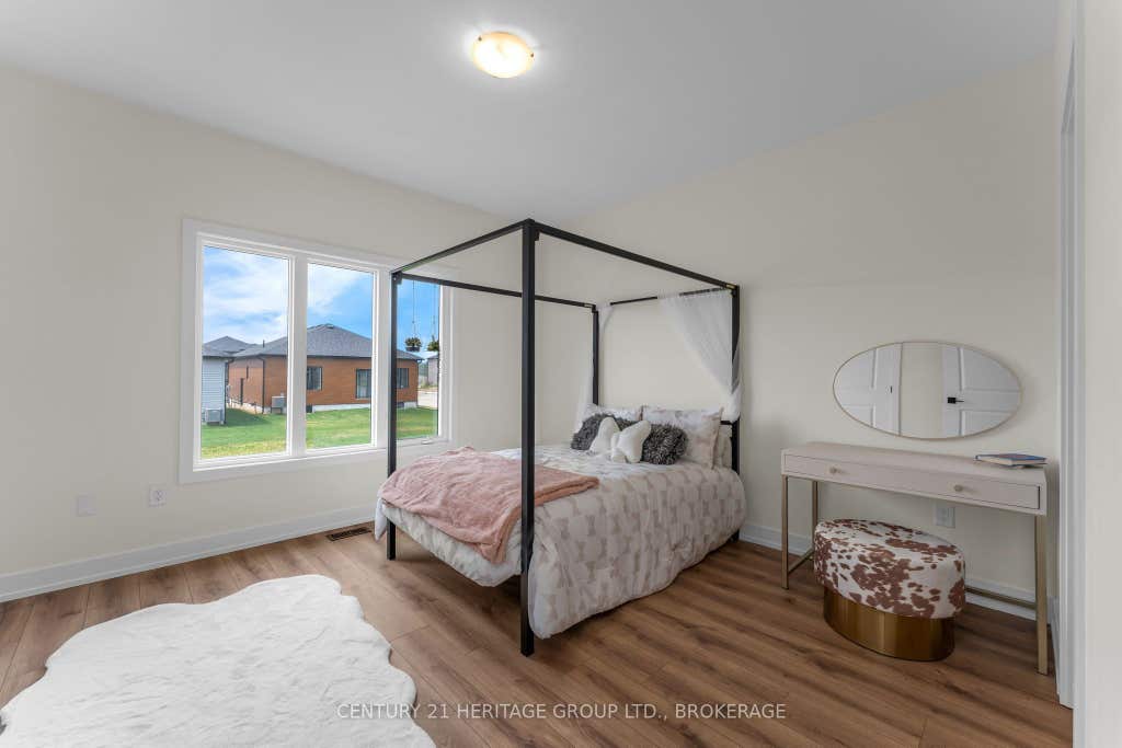 Photo of 60 Dusenbury Drive, Loyalist, ON K0H 2H0 (MLS # X13653032)