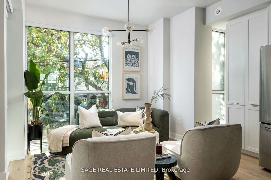 Photo of 1331 Queen Street E #Th01, Toronto, ON M4L 0B1 (MLS # E12671326)