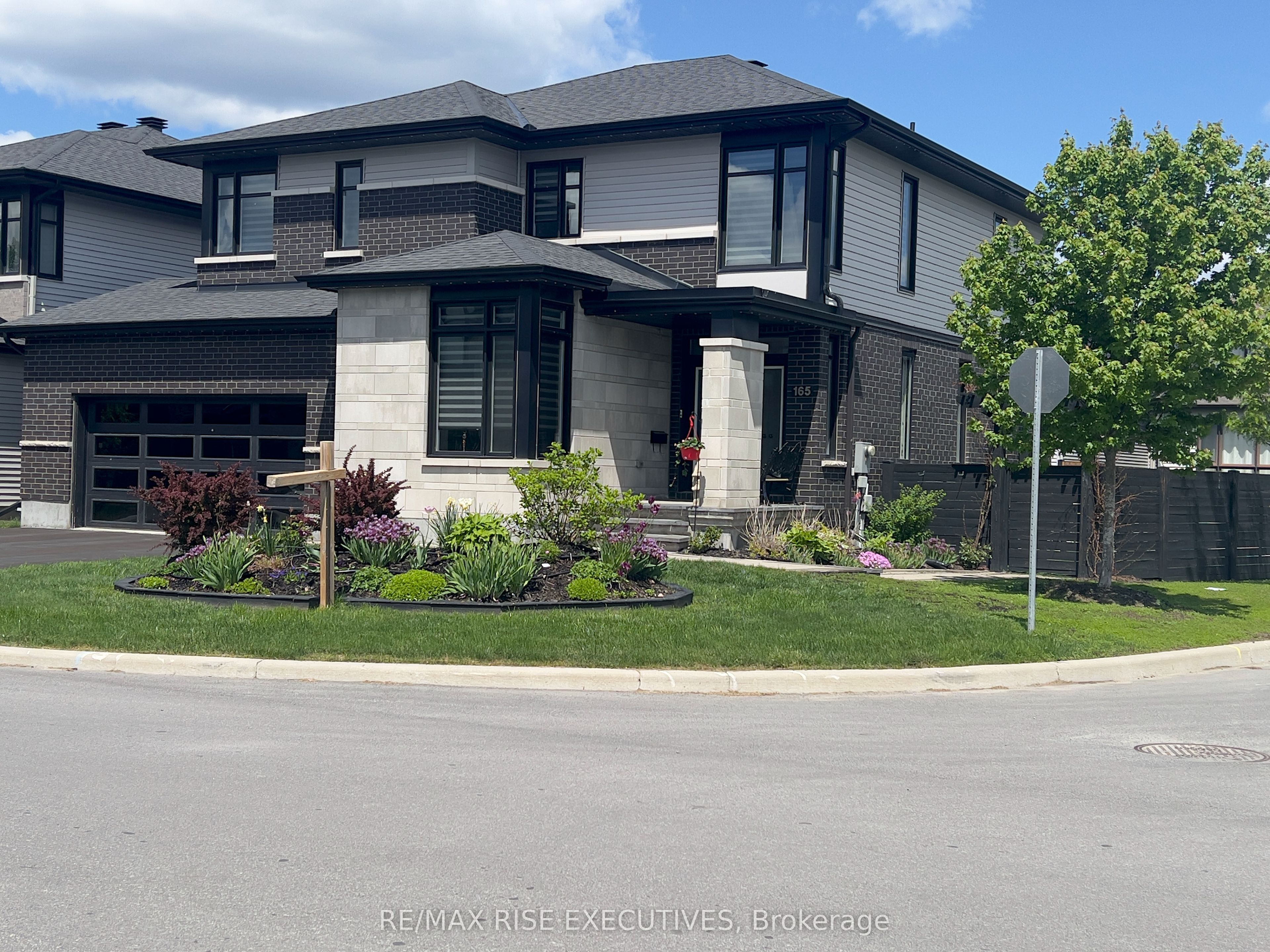 Fully landscaped/fenced large lot