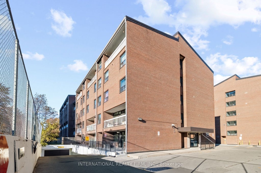 Photo of 4064 Lawrence Avenue E #323, Toronto, ON M1E 4V6 (MLS # E14109630)