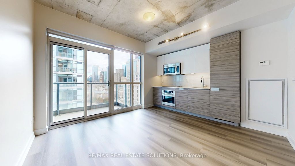 Photo of 210 Simcoe Street #1303, Toronto, ON M5T 0A9 (MLS # C12556156)