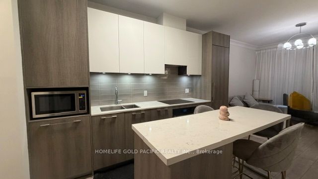 Photo of 38 Water Walk Drive #731, Markham, ON L3R 6M8 (MLS # N13140136)