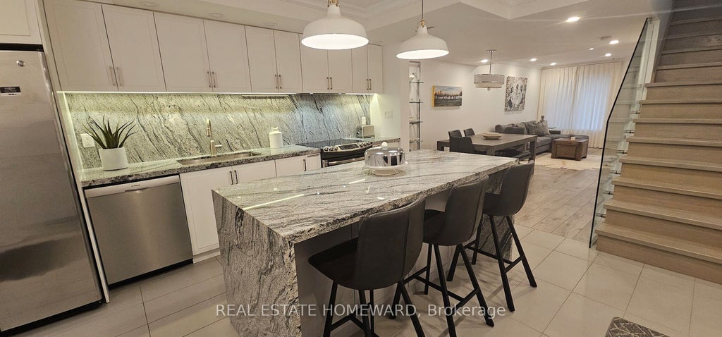 Photo of 122 Glen Manor Drive #5, Toronto, ON M4E 2X6 (MLS # E13730018)