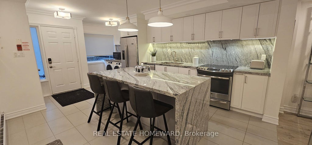 Photo of 122 Glen Manor Drive #5, Toronto, ON M4E 2X6 (MLS # E13730018)
