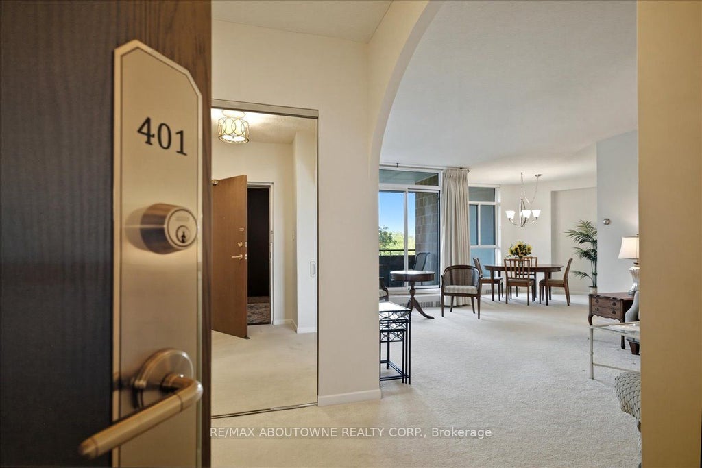 Photo of 5250 Lakeshore Road #401, Burlington, ON L7L 5L2 (MLS # W13746256)