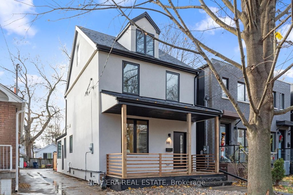 Photo of 148 Rhodes Avenue, Toronto, ON M4L 3A1 (MLS # E12582694)