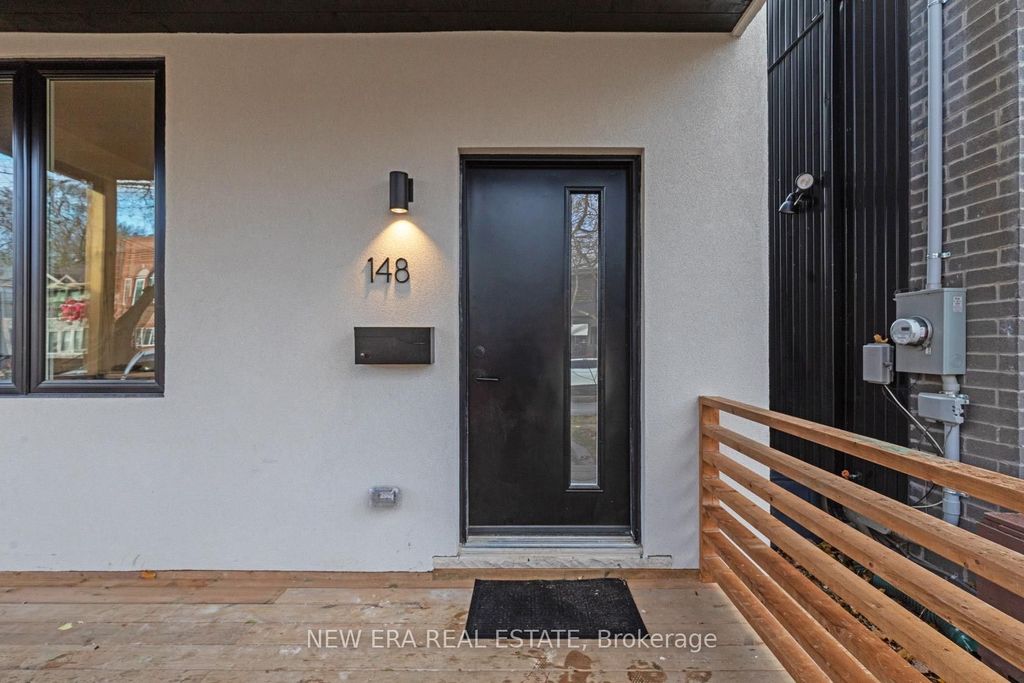 Photo of 148 Rhodes Avenue, Toronto, ON M4L 3A1 (MLS # E12582694)