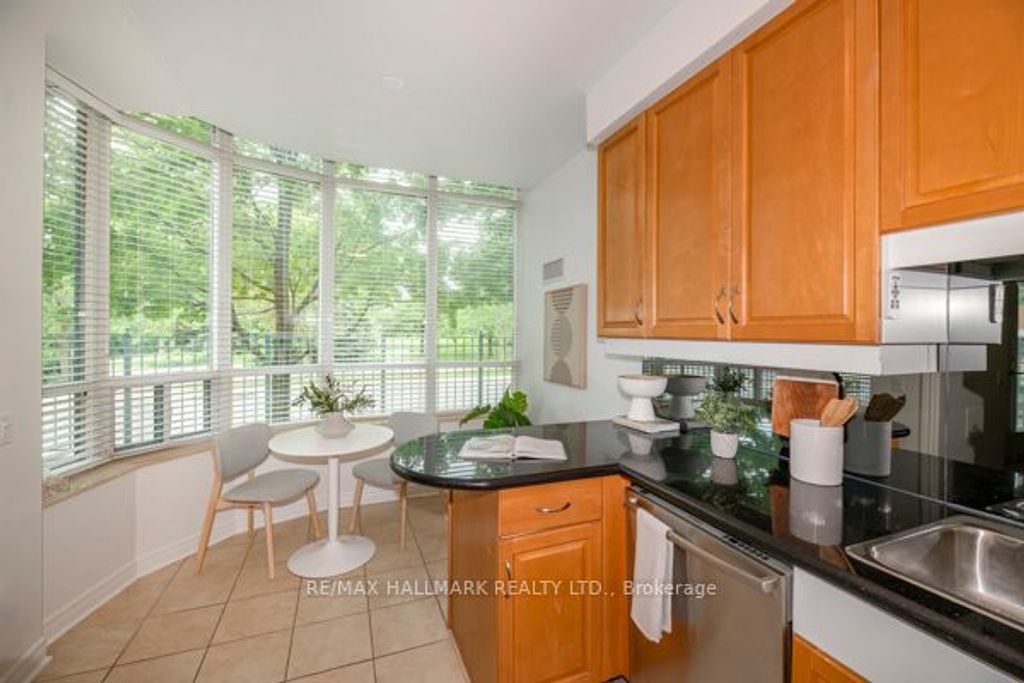 Photo of 9 Boardwalk Drive #117, Toronto, ON M4L 6T1 (MLS # E13441256)