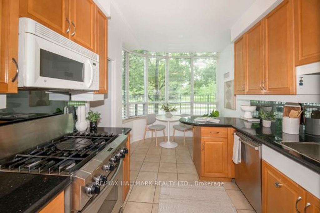 Photo of 9 Boardwalk Drive #117, Toronto, ON M4L 6T1 (MLS # E13441256)