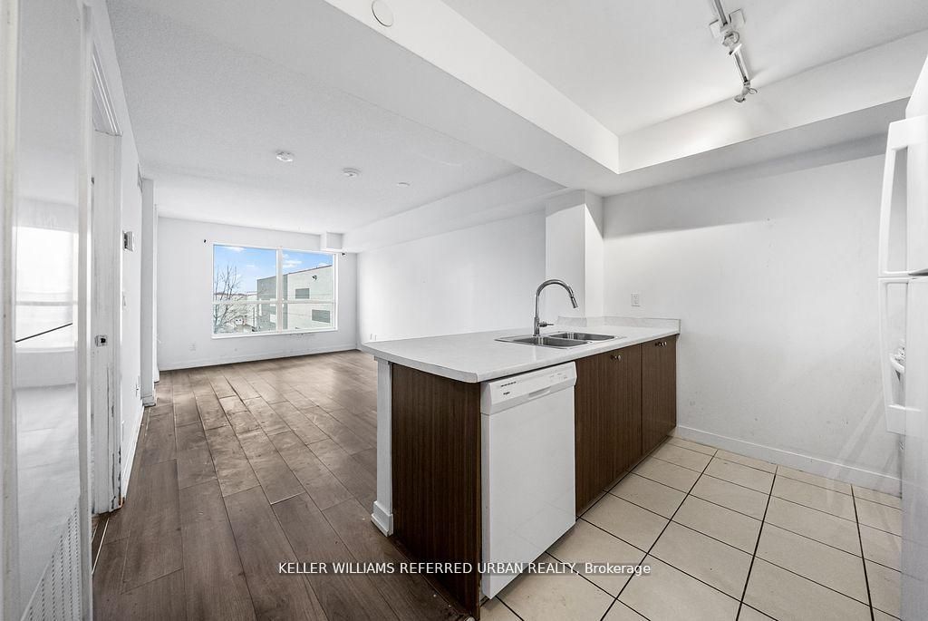 Photo of 8 Trent Avenue #315, Toronto, ON M4C 0A6 (MLS # E12413192)
