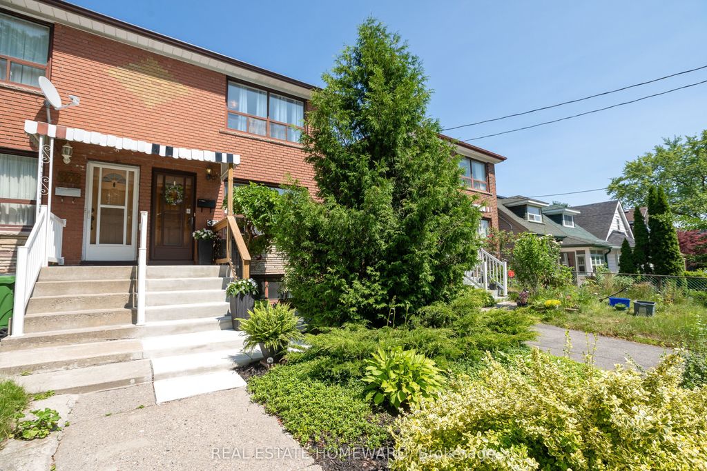Photo of 331 Rhodes Avenue, Toronto, ON M4L 3A4 (MLS # E12431413)