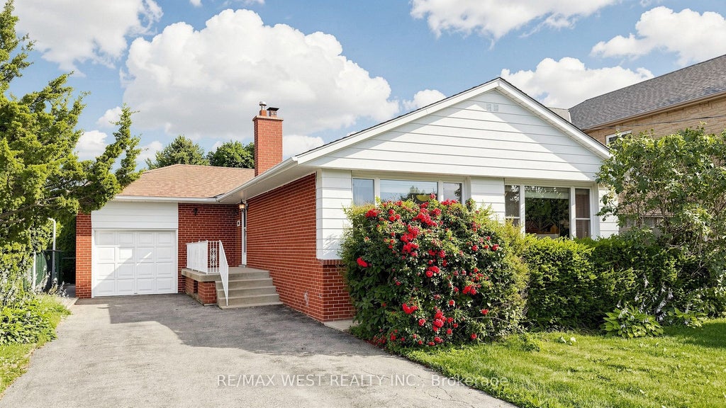 Photo of 32 Allonsius Drive, Toronto, ON M9C 3N5 (MLS # W13598786)