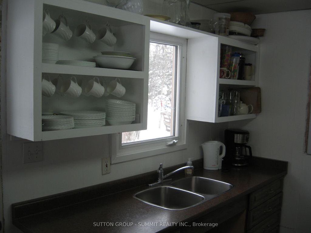 Photo of 57 Maple Grove Drive, Huntsville, ON P1H 2J3 (MLS # X12457708)