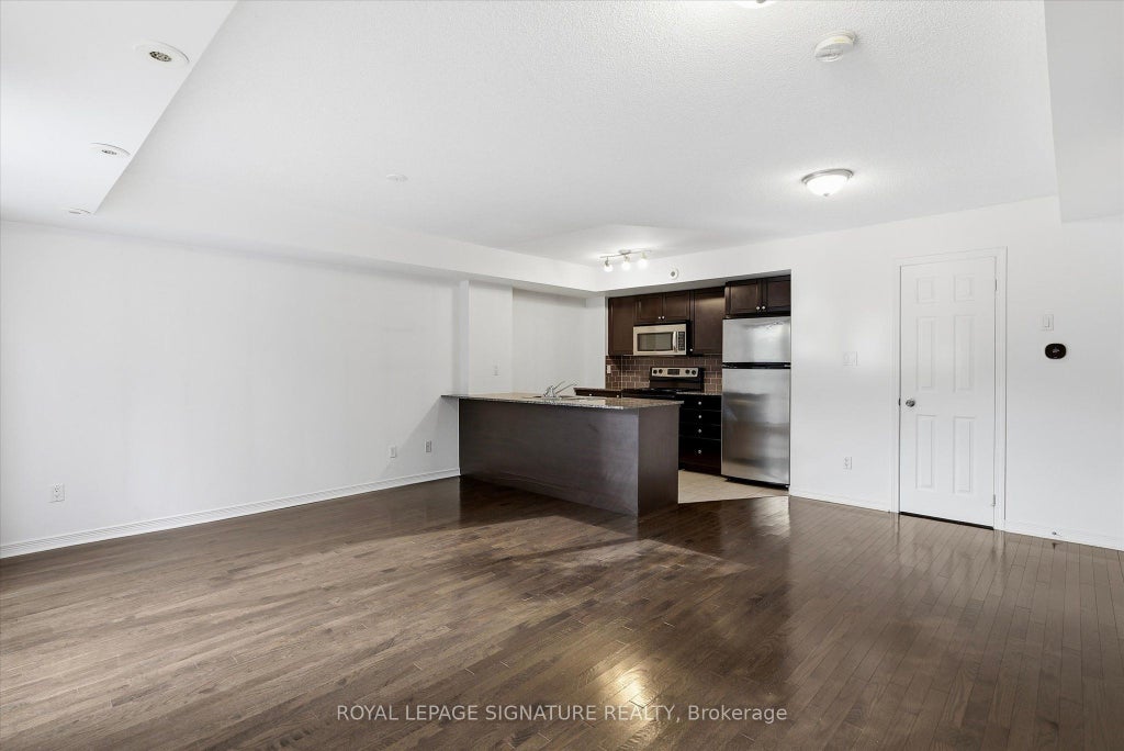 Photo of 5 Elsie Lane #TH135, Toronto, ON M6P 3N3 (MLS # W13842866)
