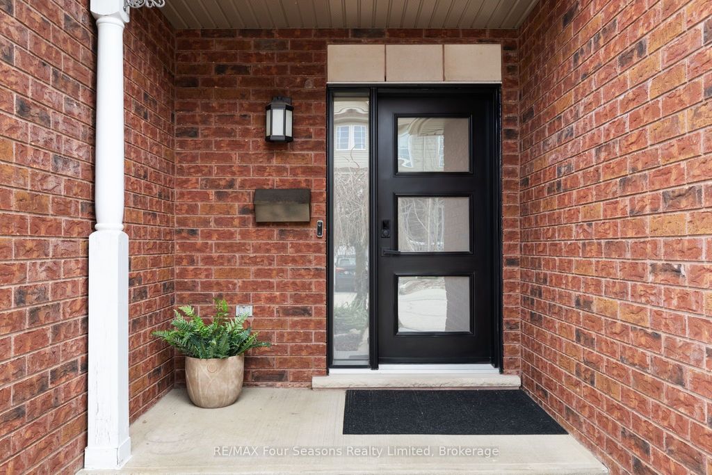 Photo of 305 Briarmeadow Drive #13, Kitchener, ON N2A 4K9 (MLS # X13027364)