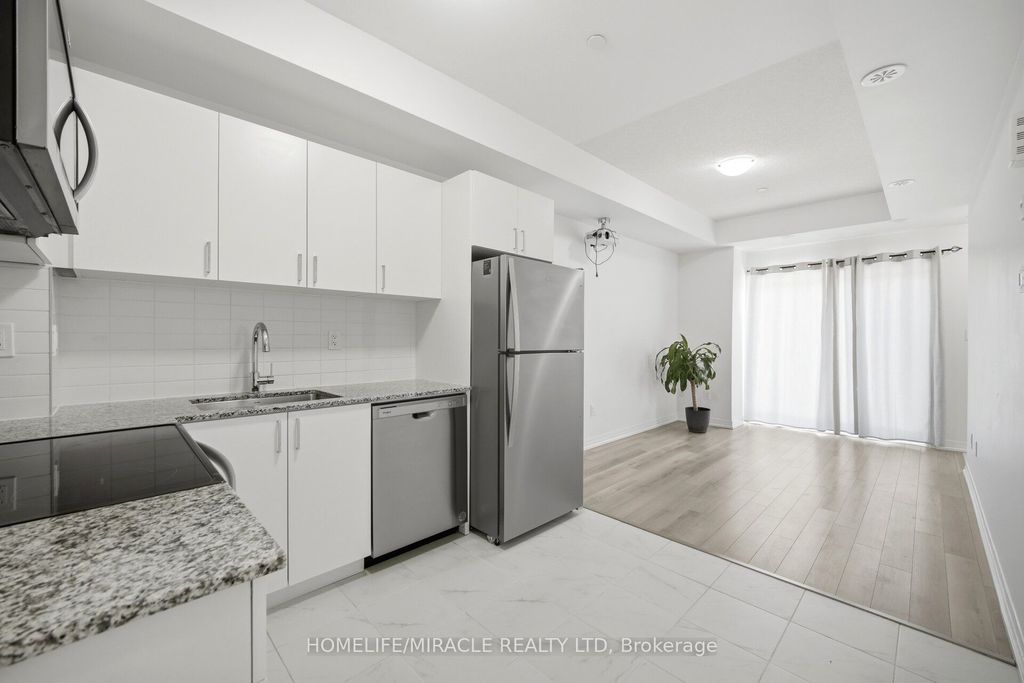 Photo of 30 Liben Way #18, Toronto, ON M1J 3Z4 (MLS # E13158888)