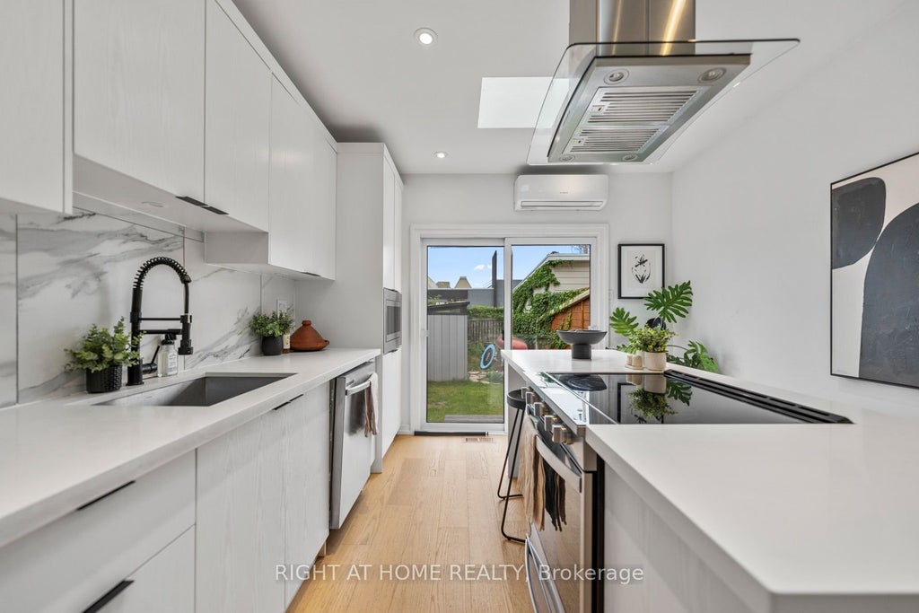 Photo of 5 1/2 Luttrell Avenue, Toronto, ON M4C 5E2 (MLS # E13792642)