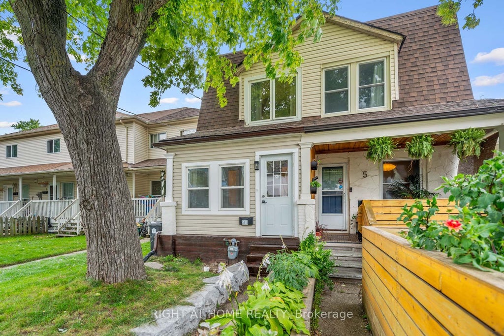 Photo of 5 1/2 Luttrell Avenue, Toronto, ON M4C 5E2 (MLS # E13792642)