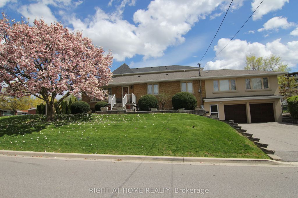 Photo of 2 Manresa Lane, Toronto, ON M6L 1H4 (MLS # W13122018)