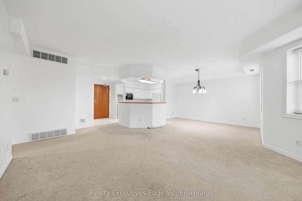Photo of 208 Silvercreek Parkway N #205, Guelph, ON N1H 8H2 (MLS # X12644048)
