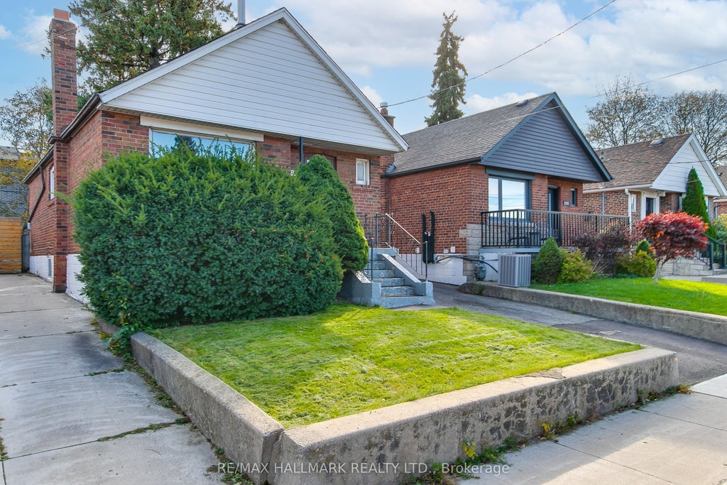 Photo of 2797 St Clair Avenue E, Toronto, ON M4B 1N1 (MLS # E14119546)