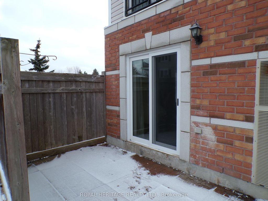 Photo of 94 Aspen Springs Drive #106, Clarington, ON L1C 5N4 (MLS # E12734904)