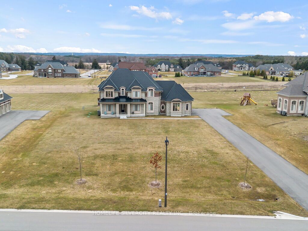 Photo of 255 Amos Drive, Caledon, ON L7E 4L7 (MLS # W13629928)