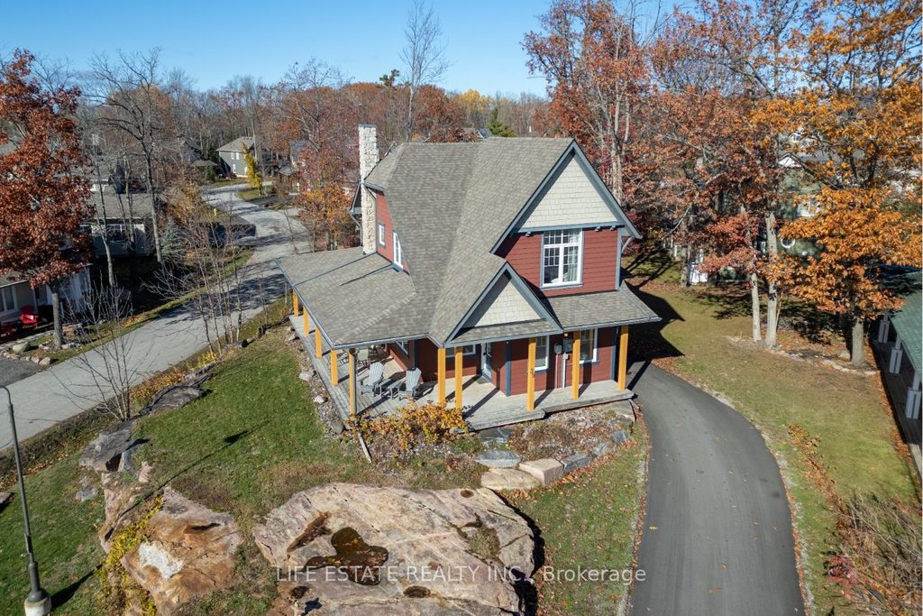 Photo of 39 Country Trail #20, Georgian Bay, ON L0K 1S0 (MLS # X12577260)