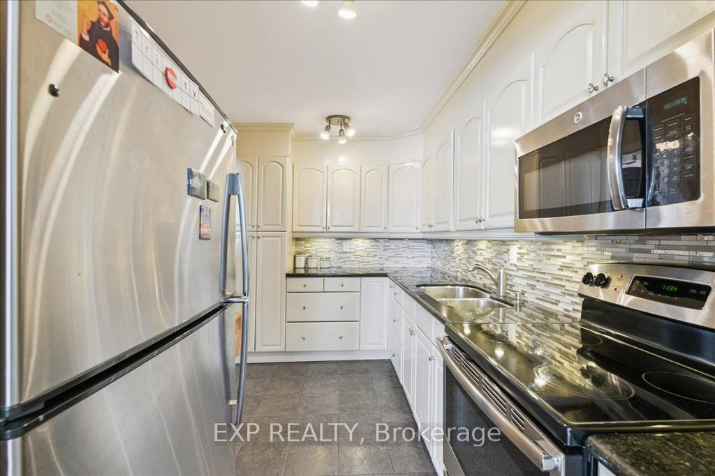 Photo of 44 Longbourne Drive #412, Toronto, ON M9R 2M7 (MLS # W13145378)