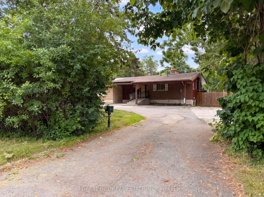Photo of 225 Carrville Road, Richmond Hill, ON L4C 6E4 (MLS # N13652628)