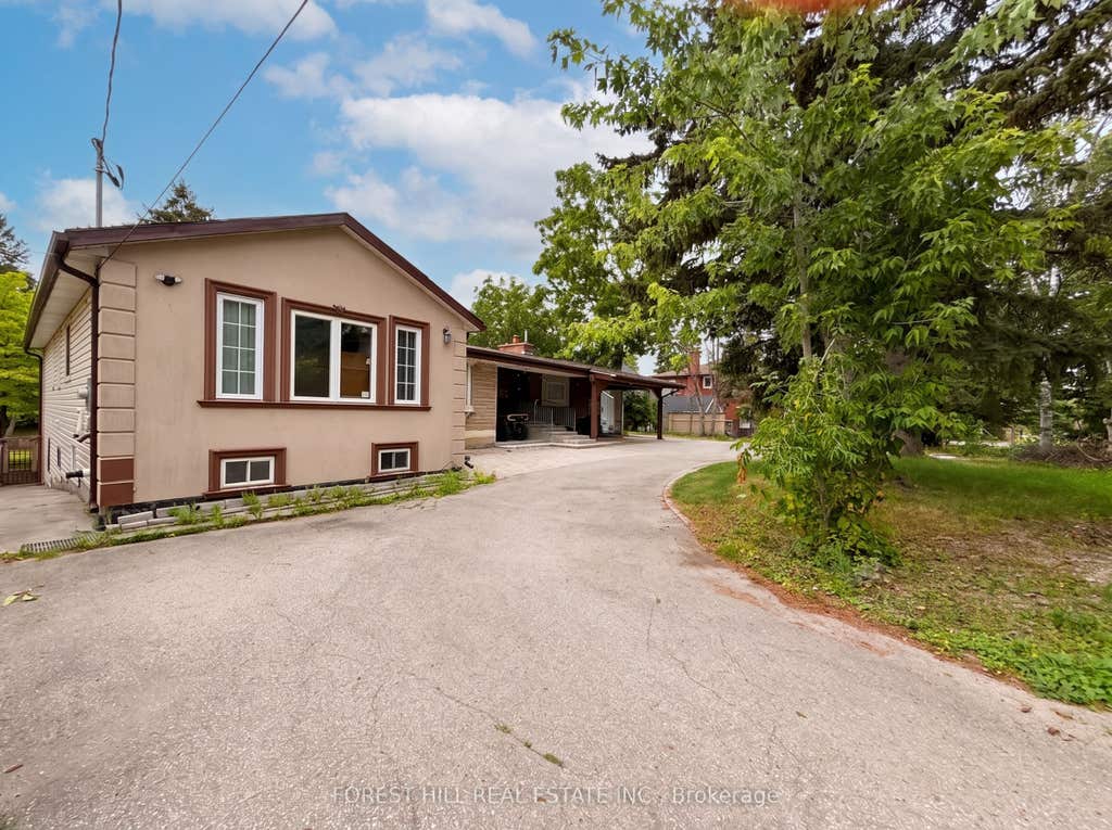 Photo of 225 Carrville Road, Richmond Hill, ON L4C 6E4 (MLS # N13652628)