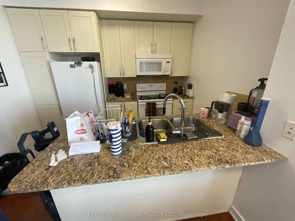 Photo of 4070 Confederation Parkway #3009, Mississauga, ON L5B 0E9 (MLS # W13767610)