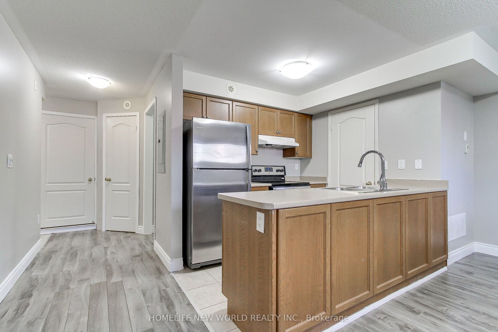 Photo of 133 Isaac Devins Boulevard #3, Toronto, ON M9M 0C4 (MLS # W13807338)