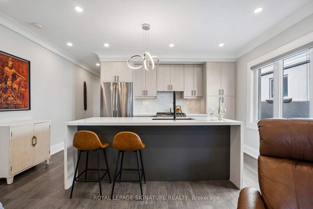 Photo of 972 Cosburn Avenue, Toronto, ON M4C 2W9 (MLS # E13121820)