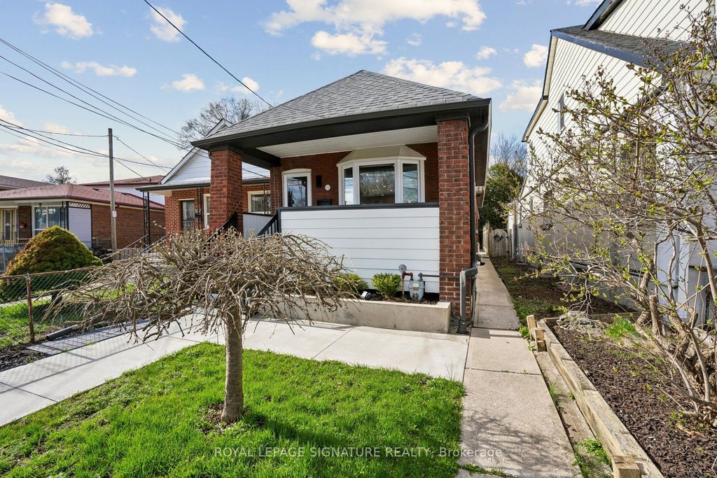 Photo of 972 Cosburn Avenue, Toronto, ON M4C 2W9 (MLS # E13121820)