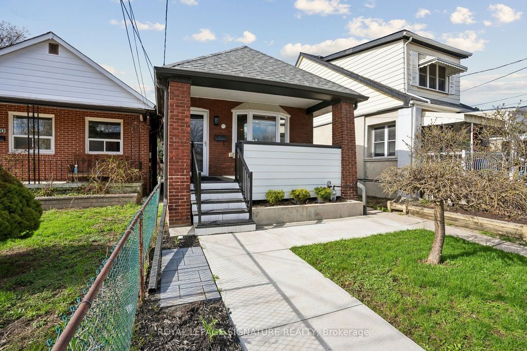 Photo of 972 Cosburn Avenue, Toronto, ON M4C 2W9 (MLS # E13121820)