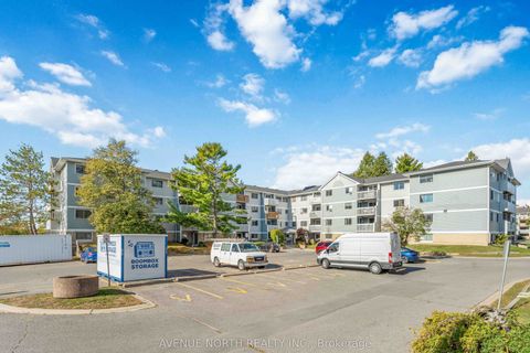 Photo of 214 Viewmount Drive #200, Cityview - Parkwoods Hills - Rideau Shore, ON K2E 7X3 (MLS # X12472618)