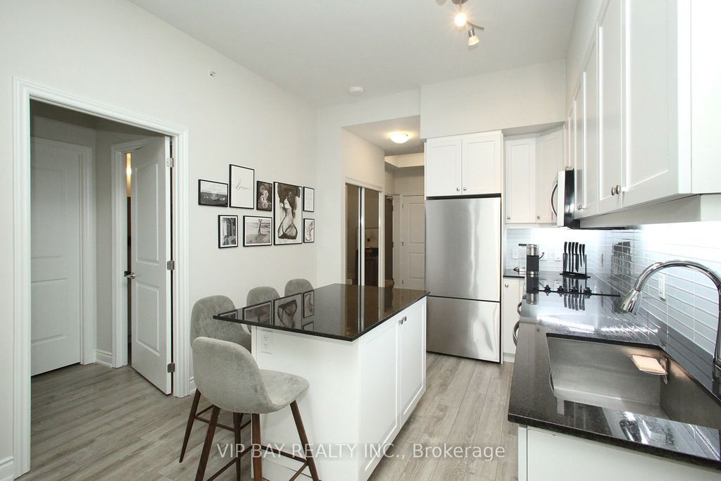 Photo of 9618 Yonge Street #511, Richmond Hill, ON L4C 0X5 (MLS # N12917444)