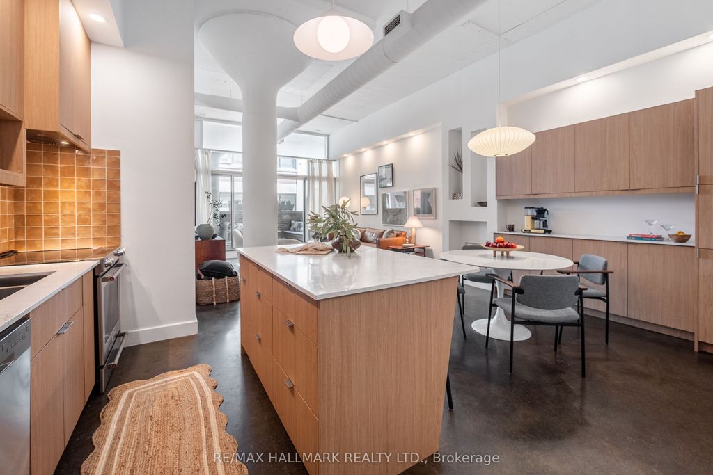 Photo of 233 Carlaw Avenue #406, Toronto, ON M4M 3N6 (MLS # E13413020)