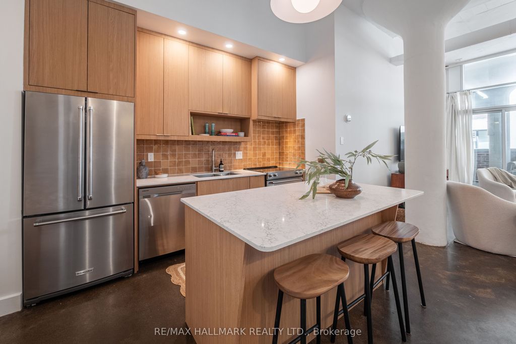 Photo of 233 Carlaw Avenue #406, Toronto, ON M4M 3N6 (MLS # E13413020)