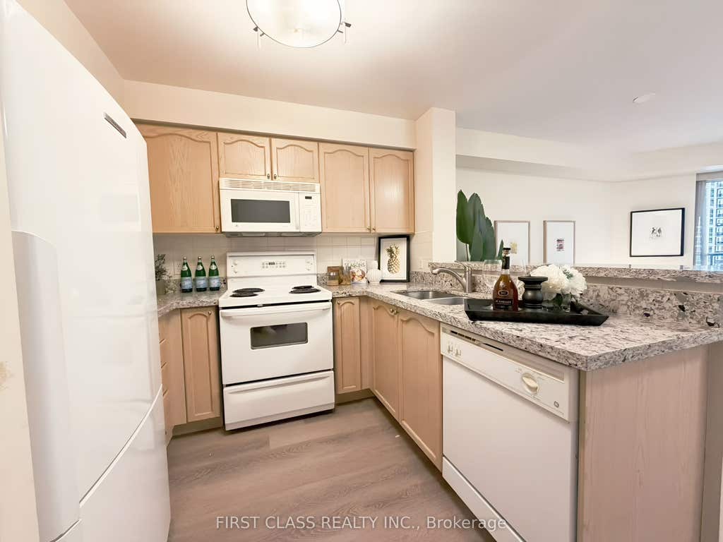 Photo of 11 Michael Power Place #715, Toronto, ON M9A 5G3 (MLS # W13546938)