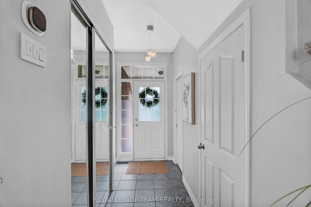 Photo of 74 Milner Downs Crescent, Kanata, ON K2M 2S5 (MLS # X13750138)