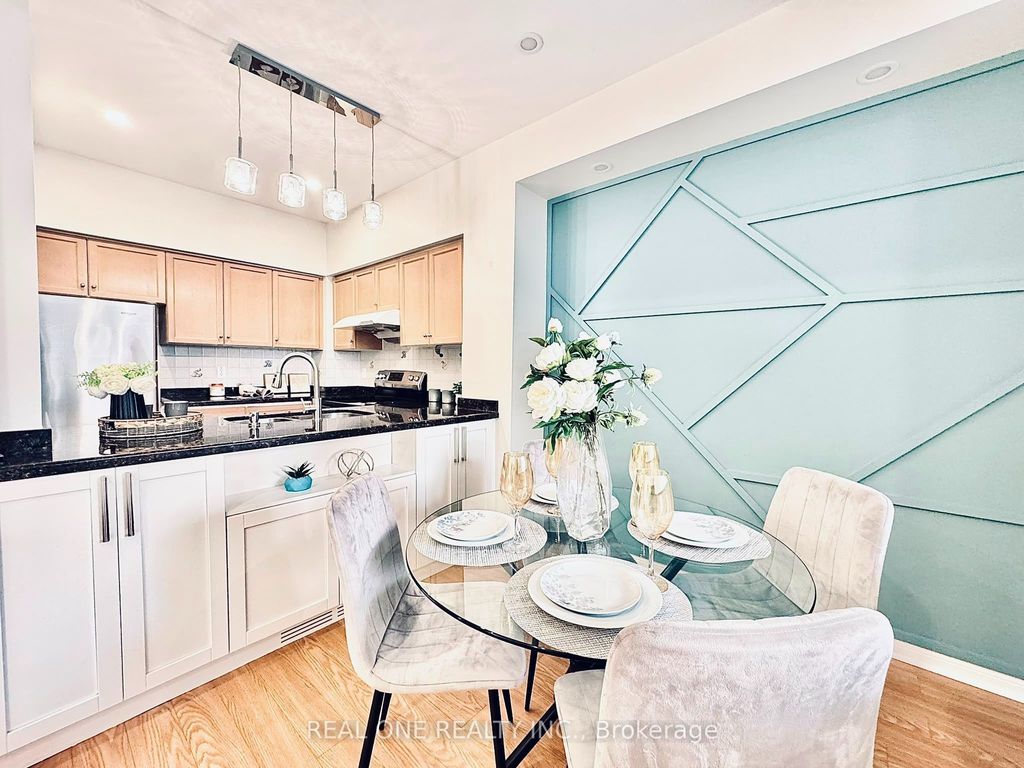 Photo of 12 St Moritz Way #6, Markham, ON L3R 4E8 (MLS # N13552400)