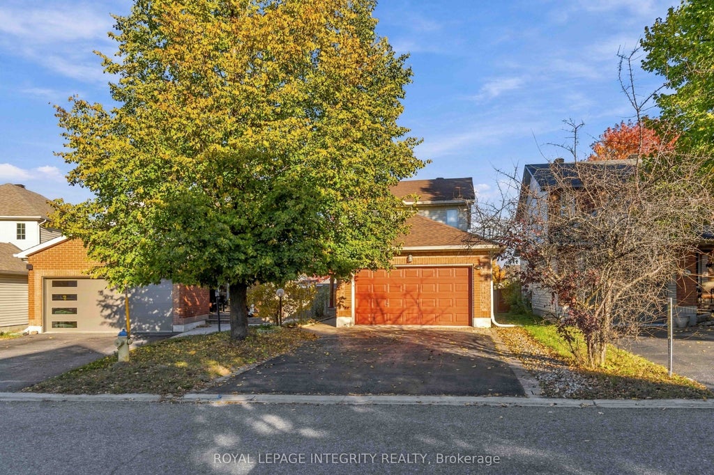 Photo of 43 Burntwood Avenue, Barrhaven, ON K2J 4P3 (MLS # X14134864)